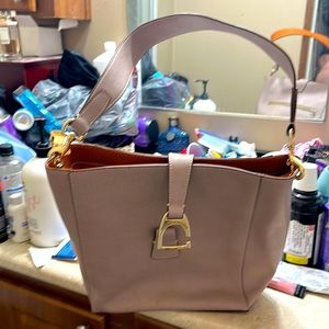 Dooney and burke bag and matching wallet.